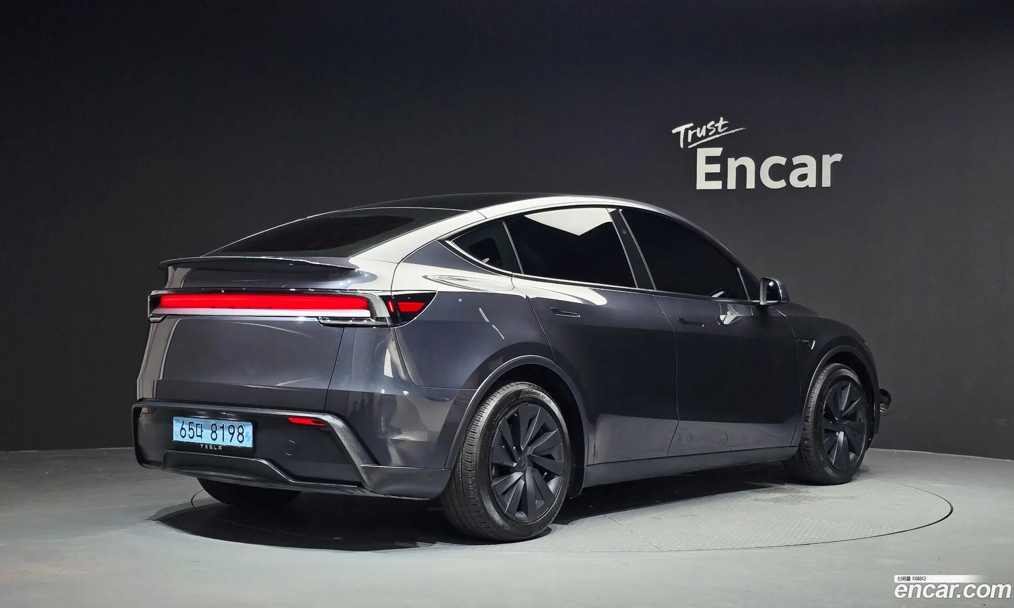 Tesla Model Y 2025 LRWYGCFJ1SC104043 — 13