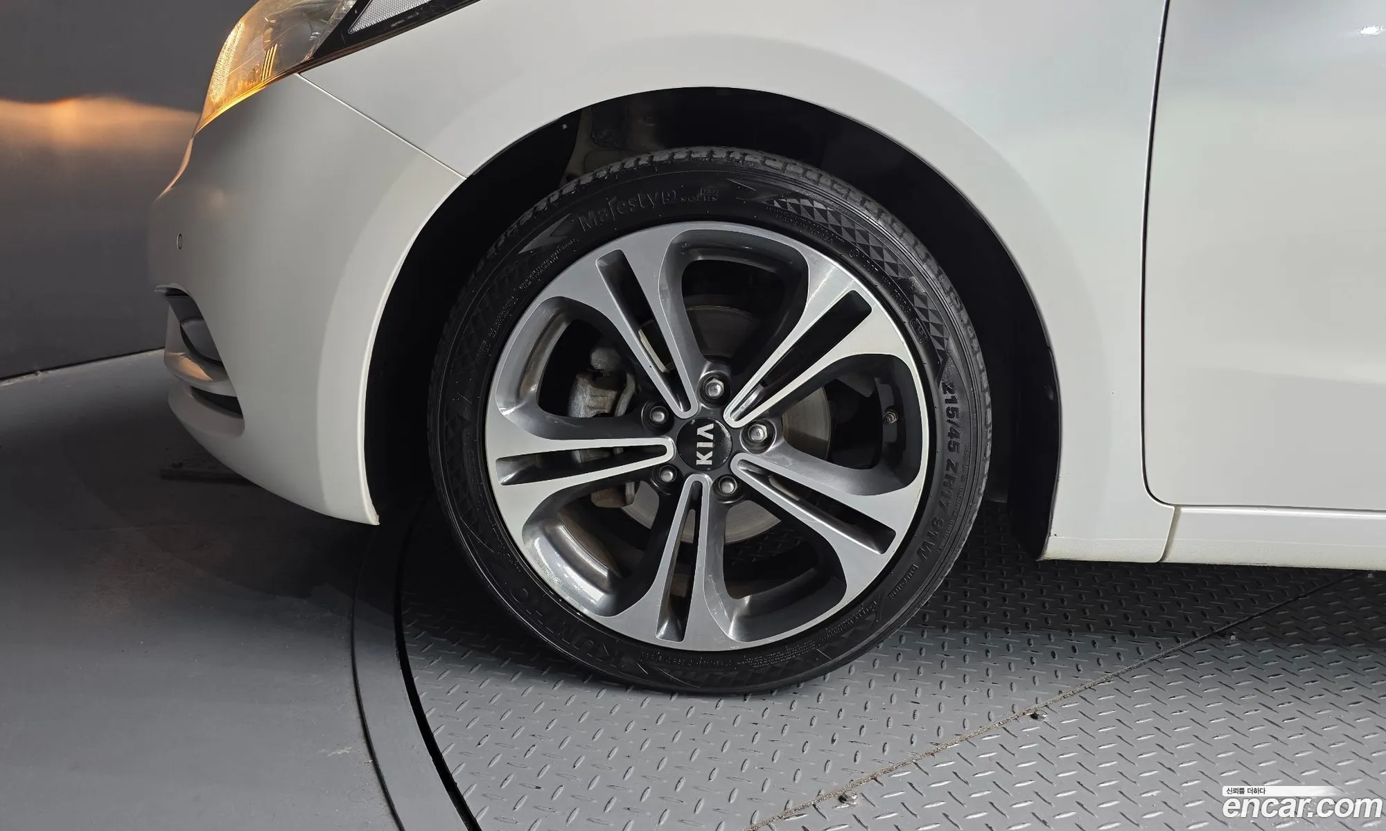 Kia K3 2012 — 3