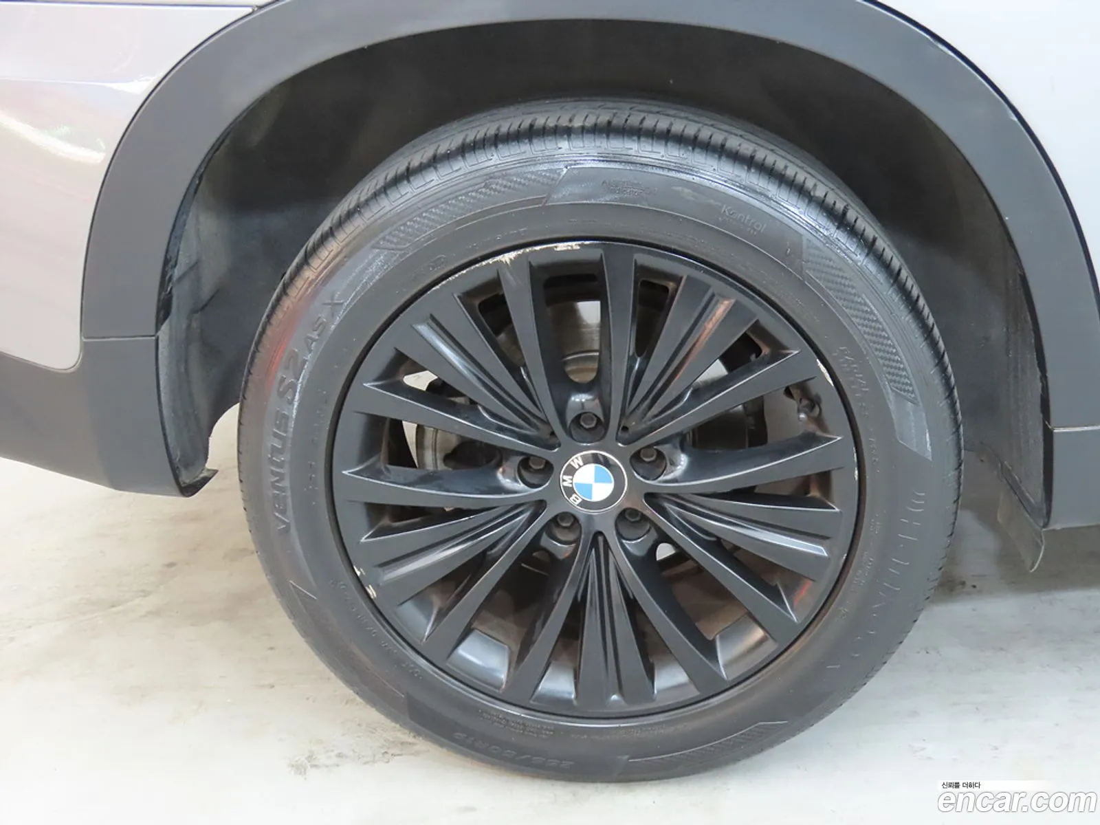 BMW X5 2010 — 7