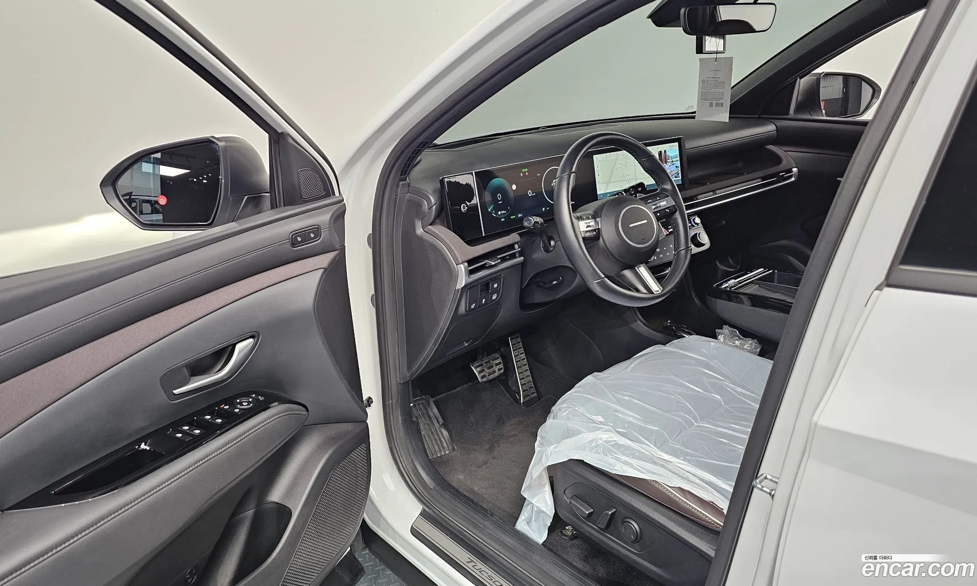 Hyundai Tucson Hybrid 2025 — 30