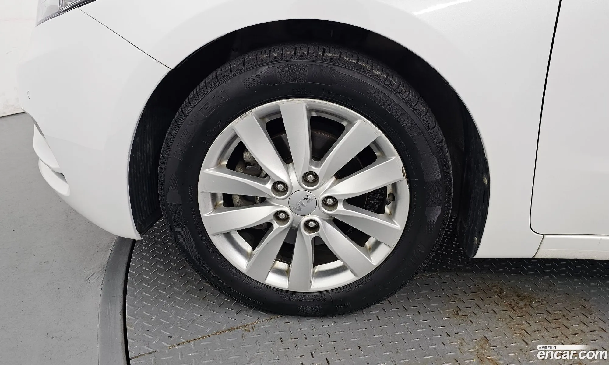 Kia K3 2014 — 13