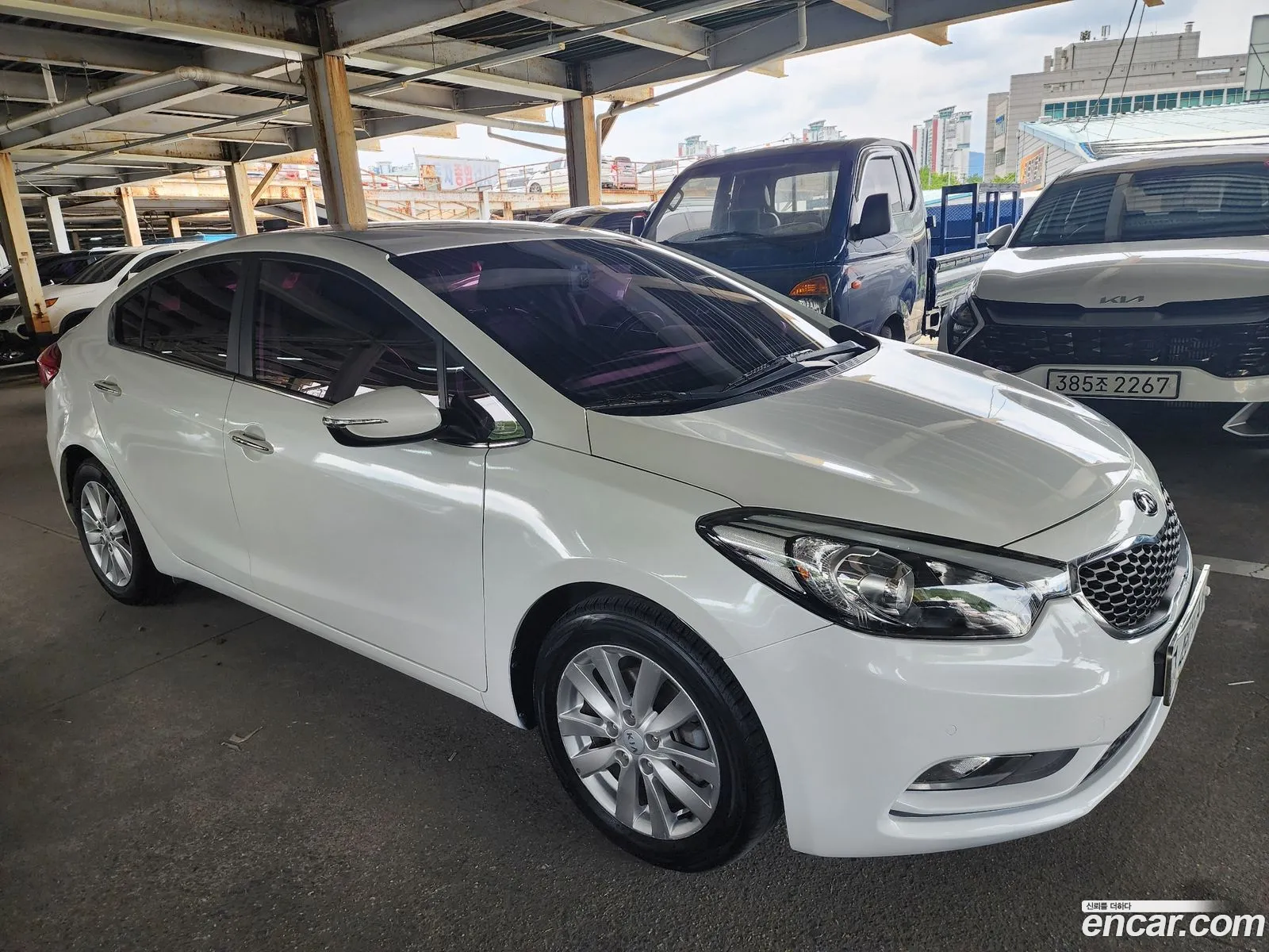 Kia K3 2014 — 15