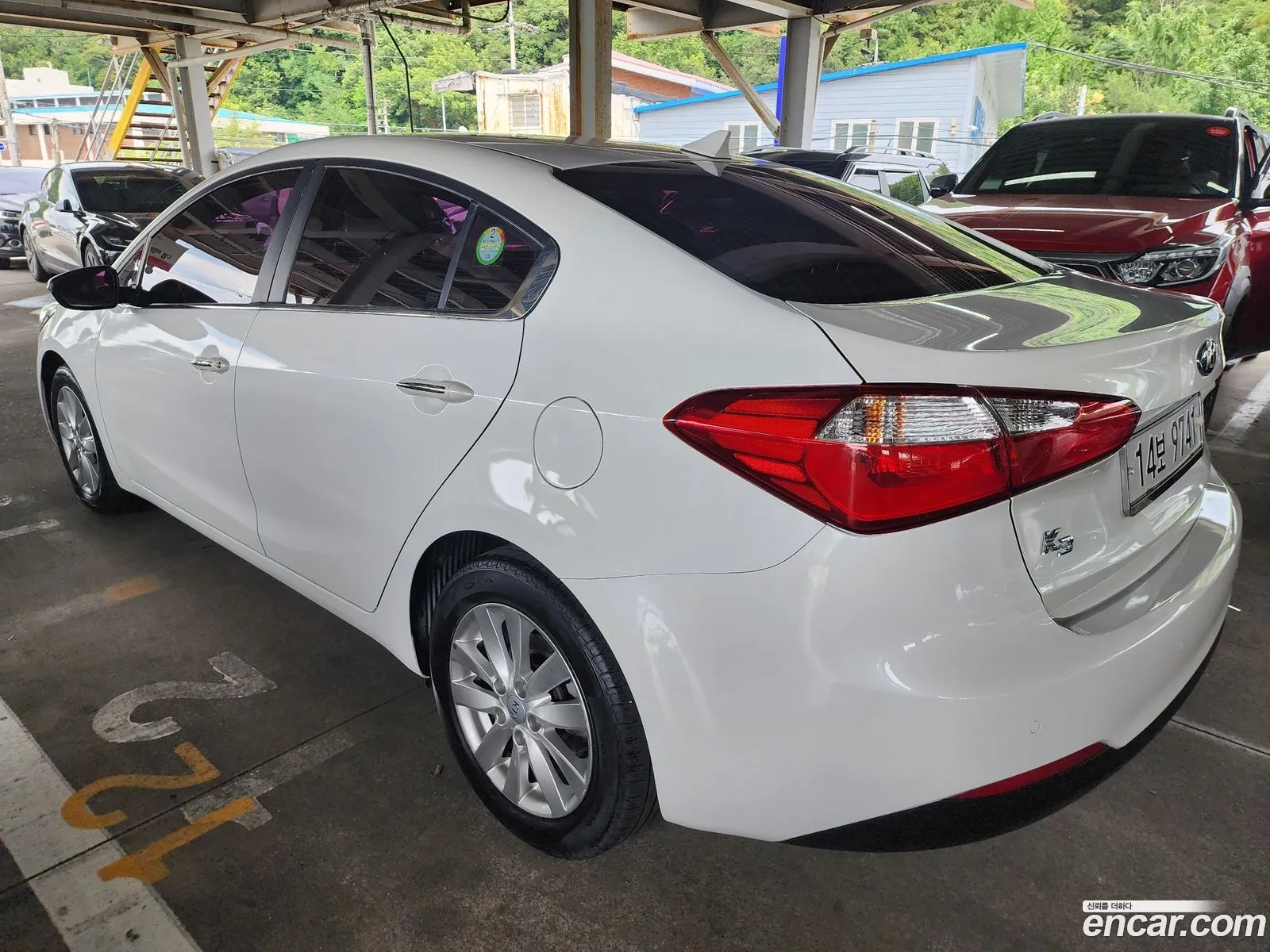 Kia K3 2014 — 2