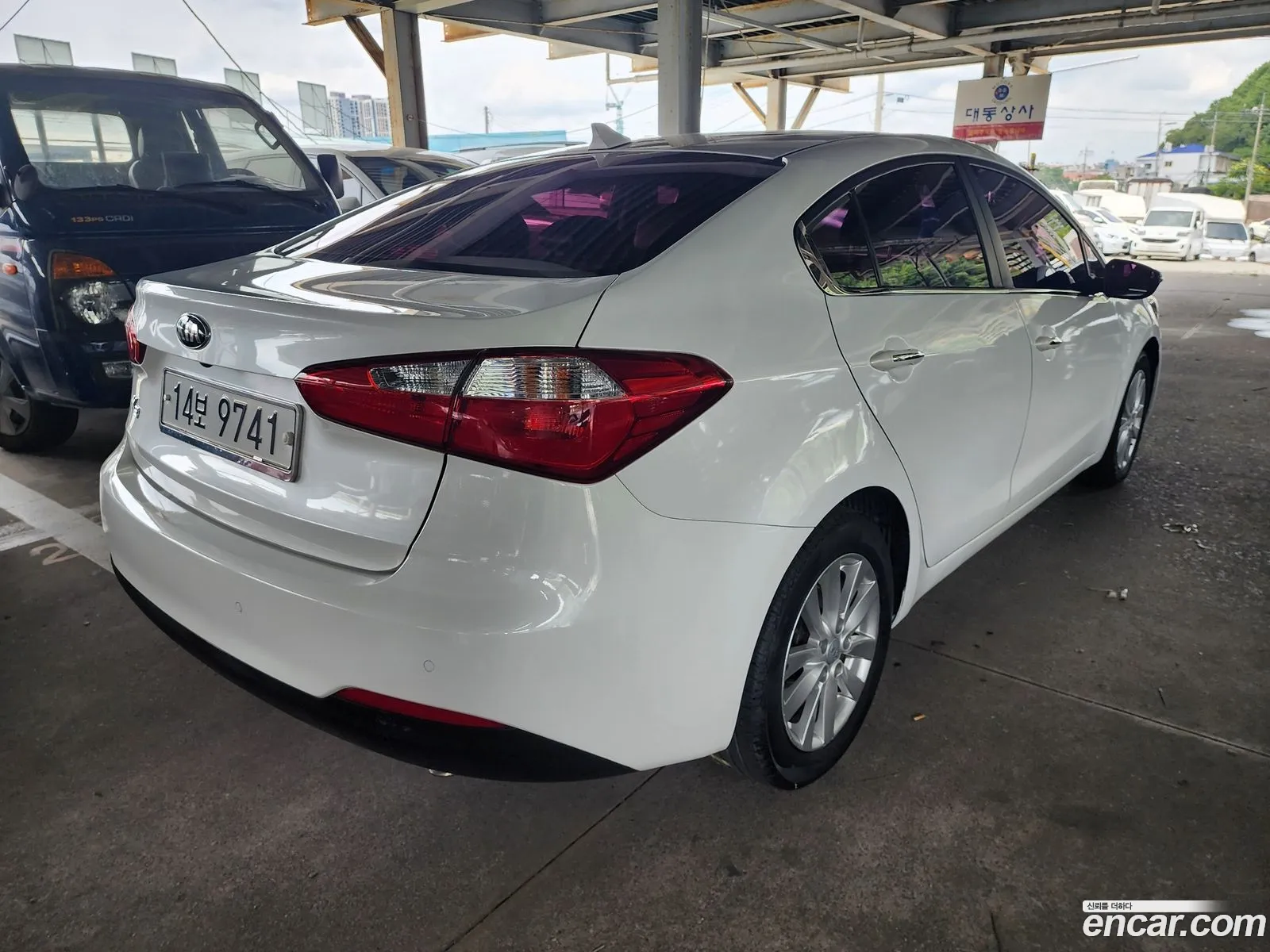 Kia K3 2014 — 14