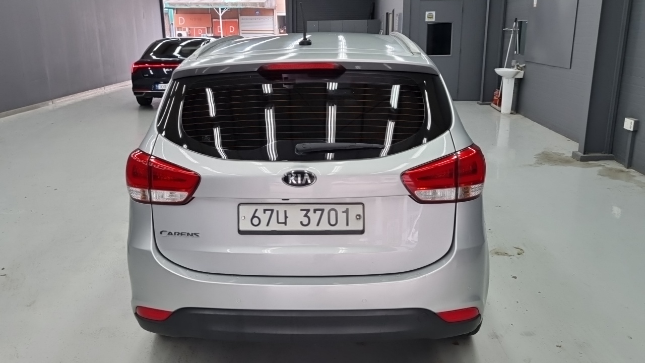 Kia Carens 2014 — 11