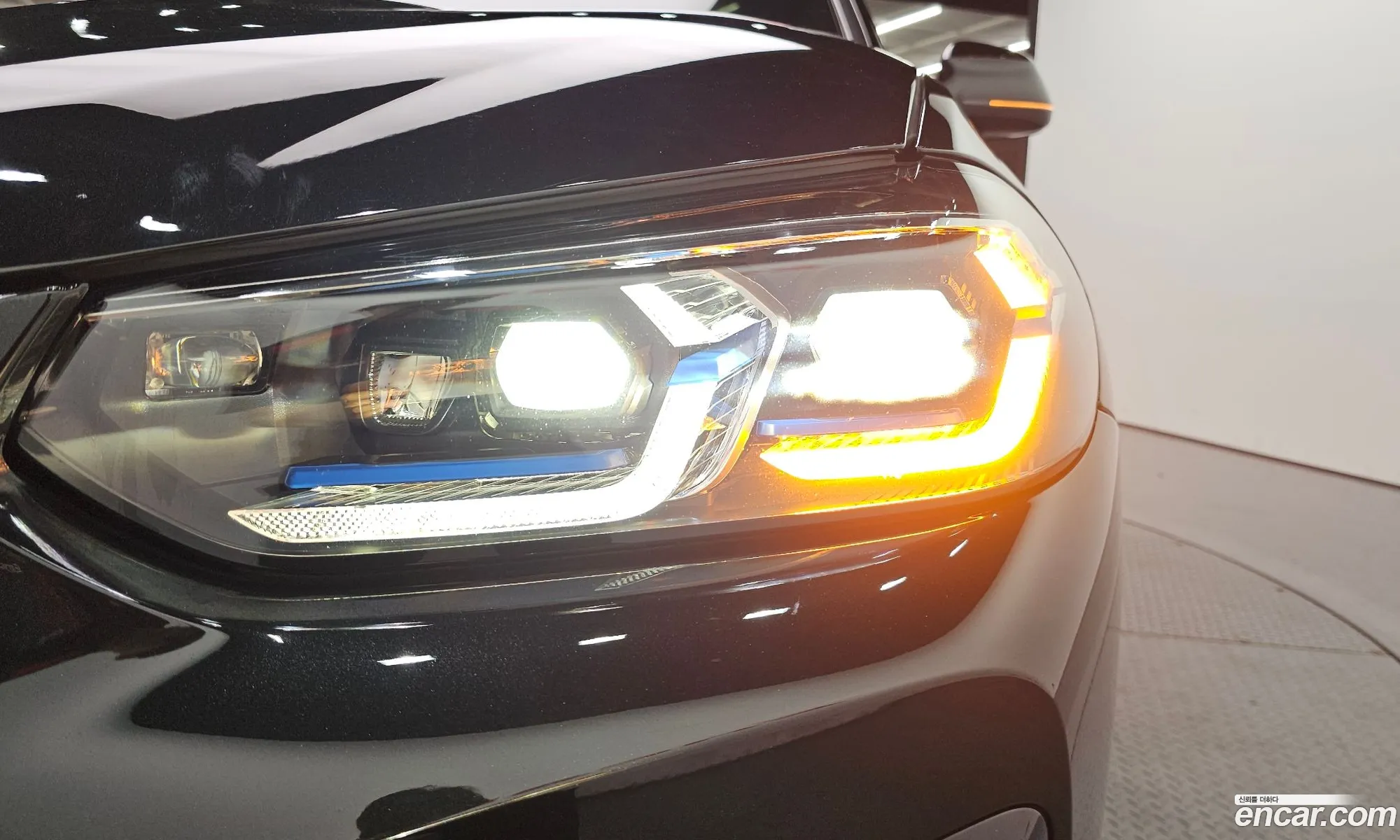 BMW X4 2022 WBA21DT03N9N34621 — 21