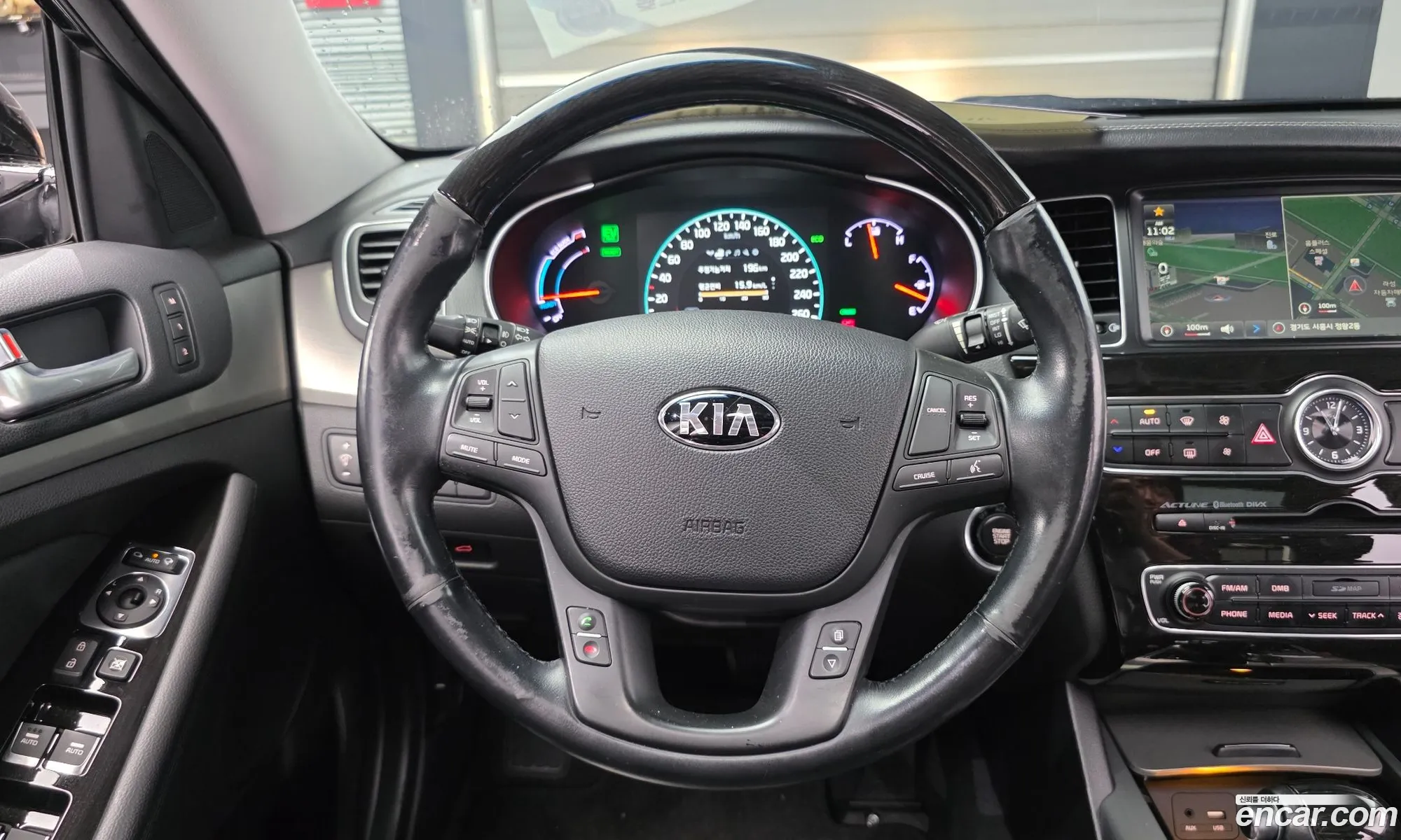 Kia K7 Hybrid 2014 — 7