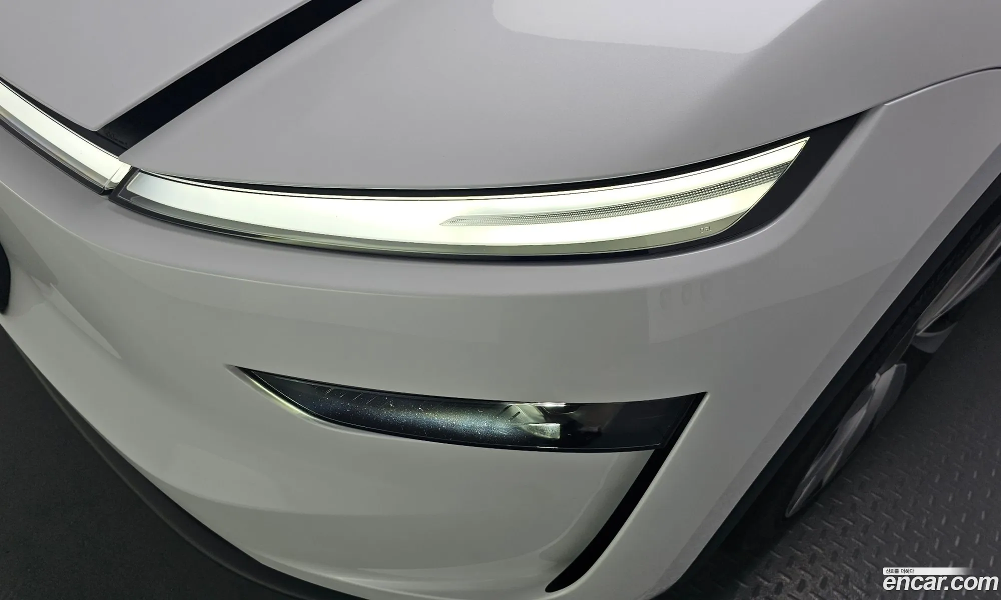 Tesla Model Y 2025 LRWYGCFJ4SC029709 — 24