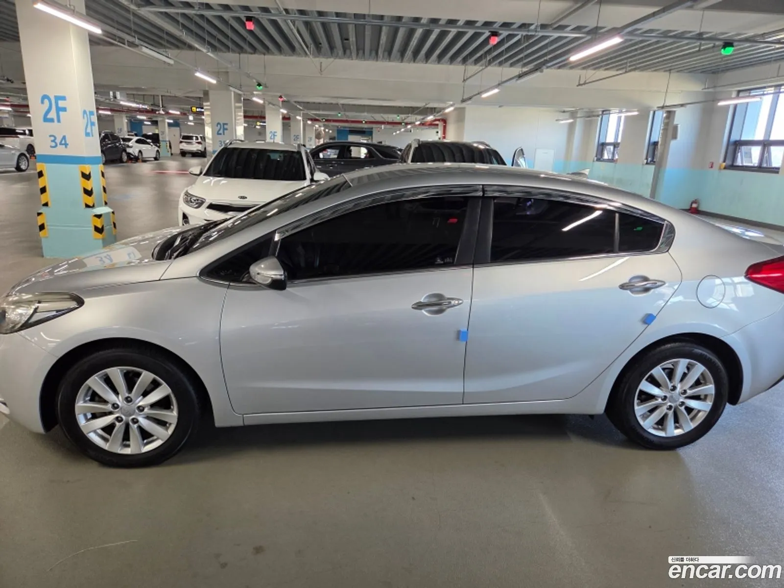 Kia K3 2013 — 2