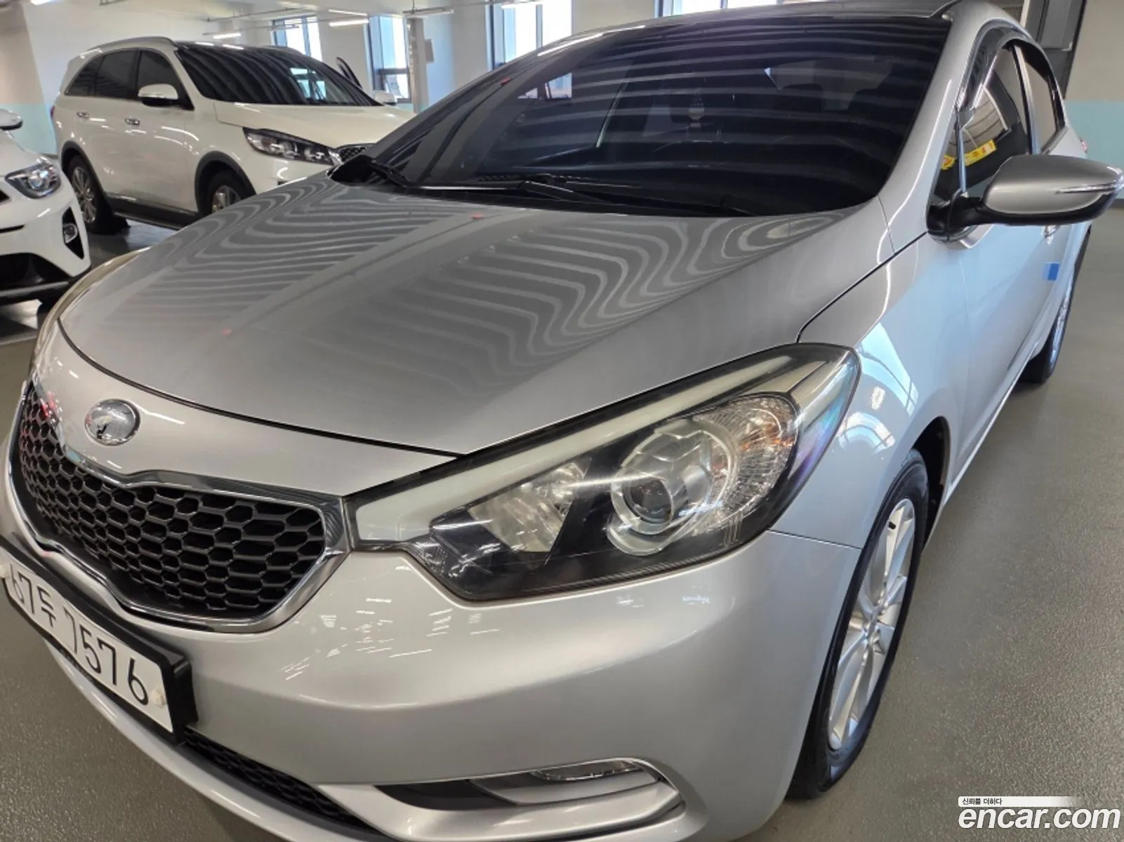 Kia K3 2013 — 3