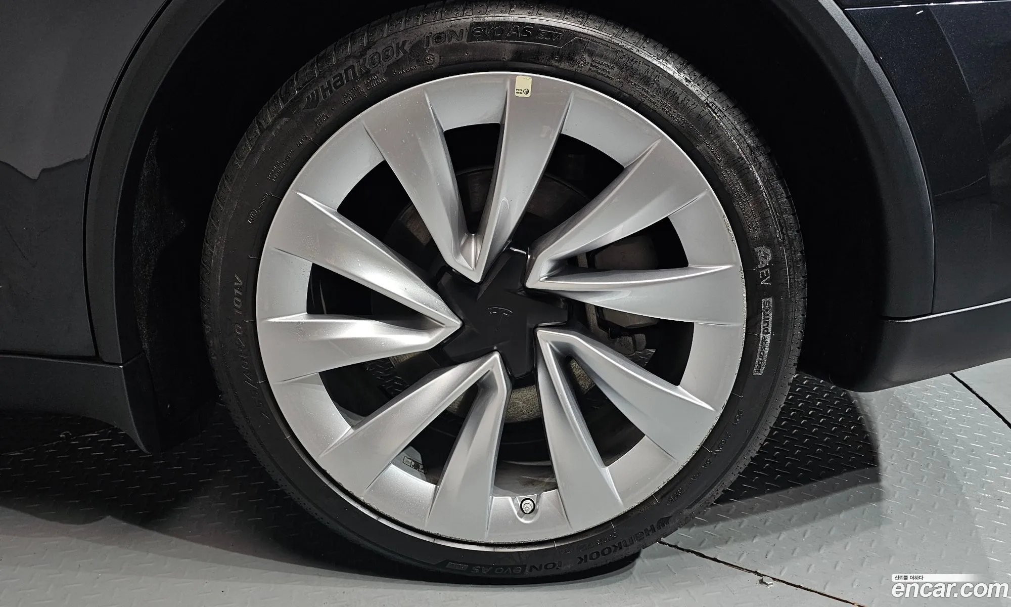 Tesla Model Y 2025 LRWYGCEK7SC077750 — 6