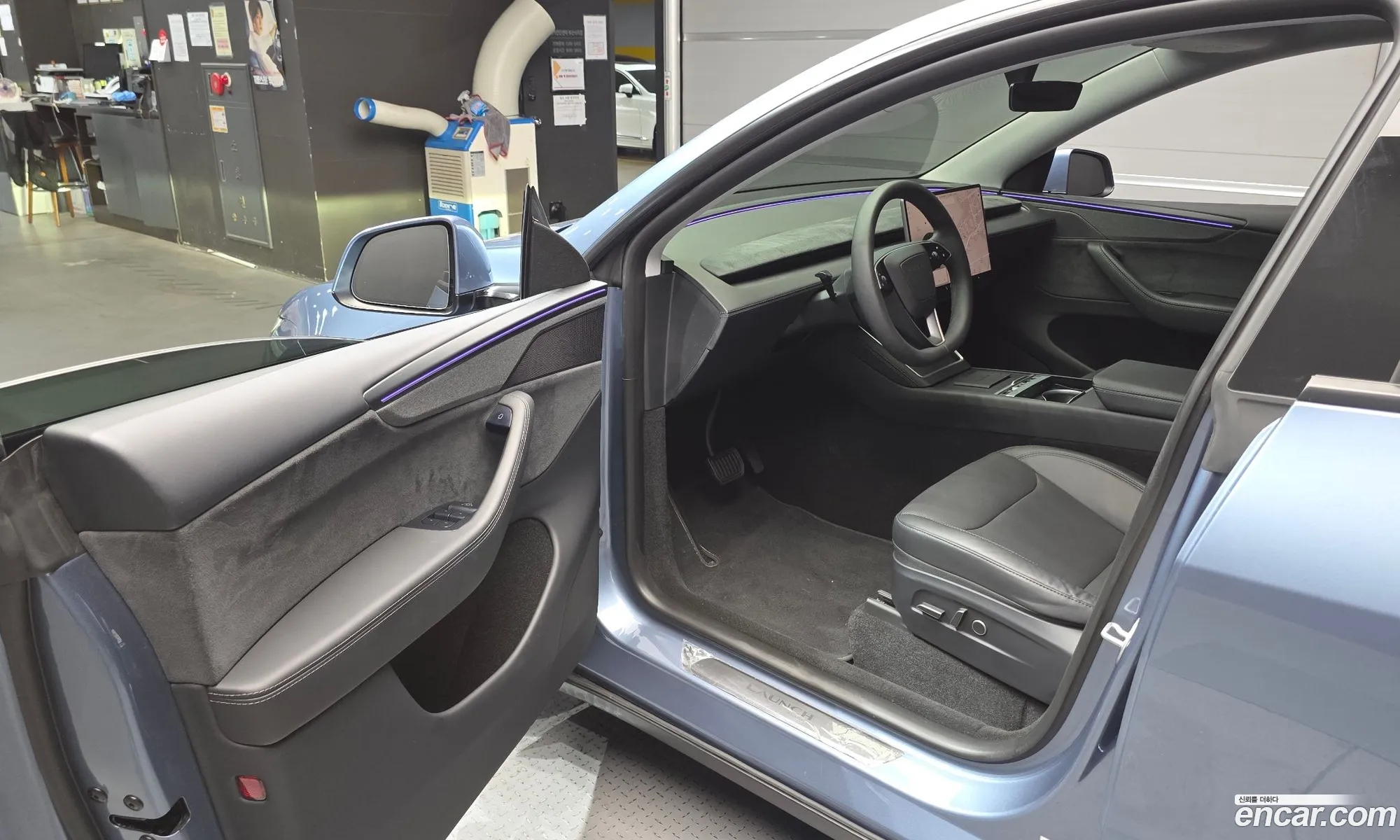 Tesla Model Y 2025 LRWYGCEK1SC055579 — 30