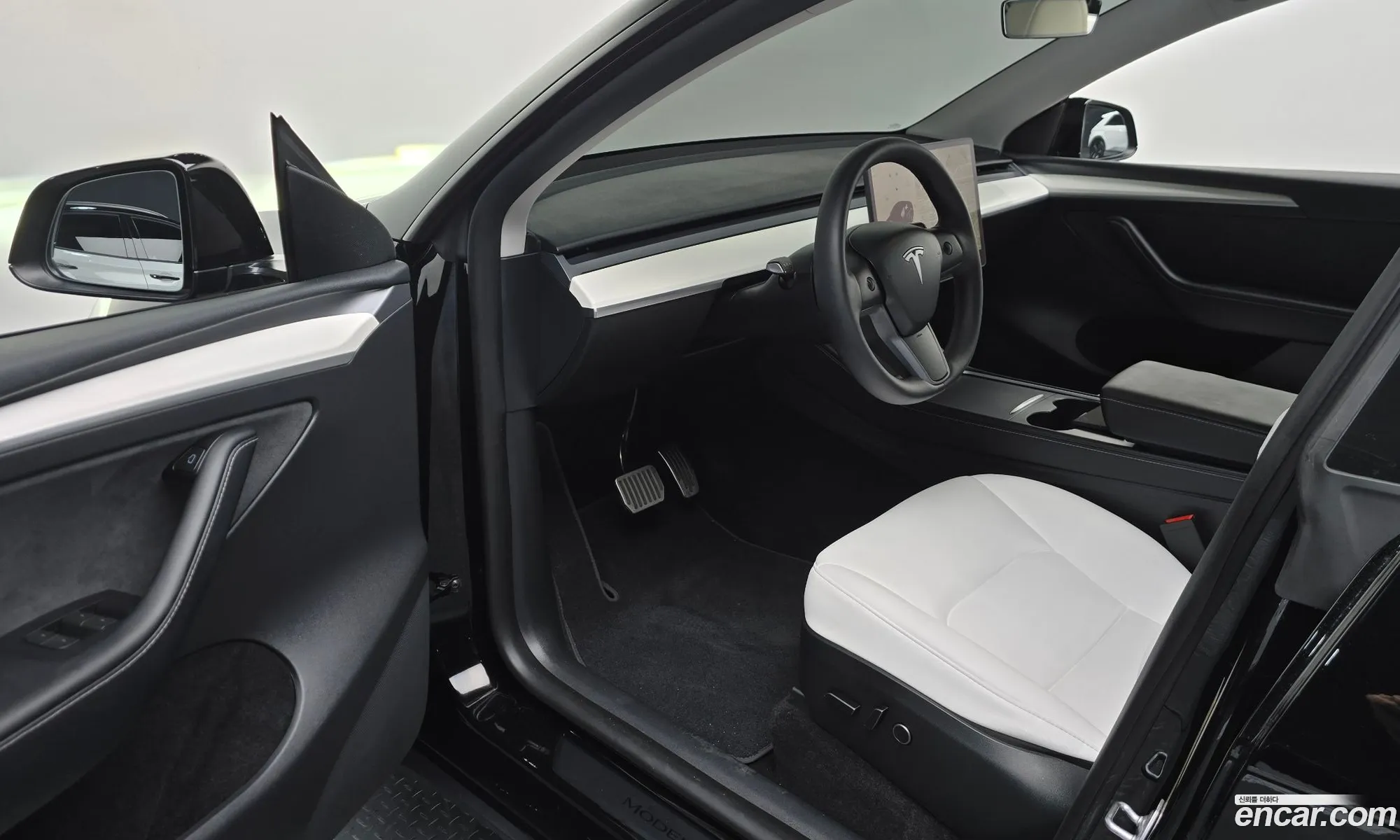 Tesla Model Y 2023 LRWYGCFS7RC176917 — 7