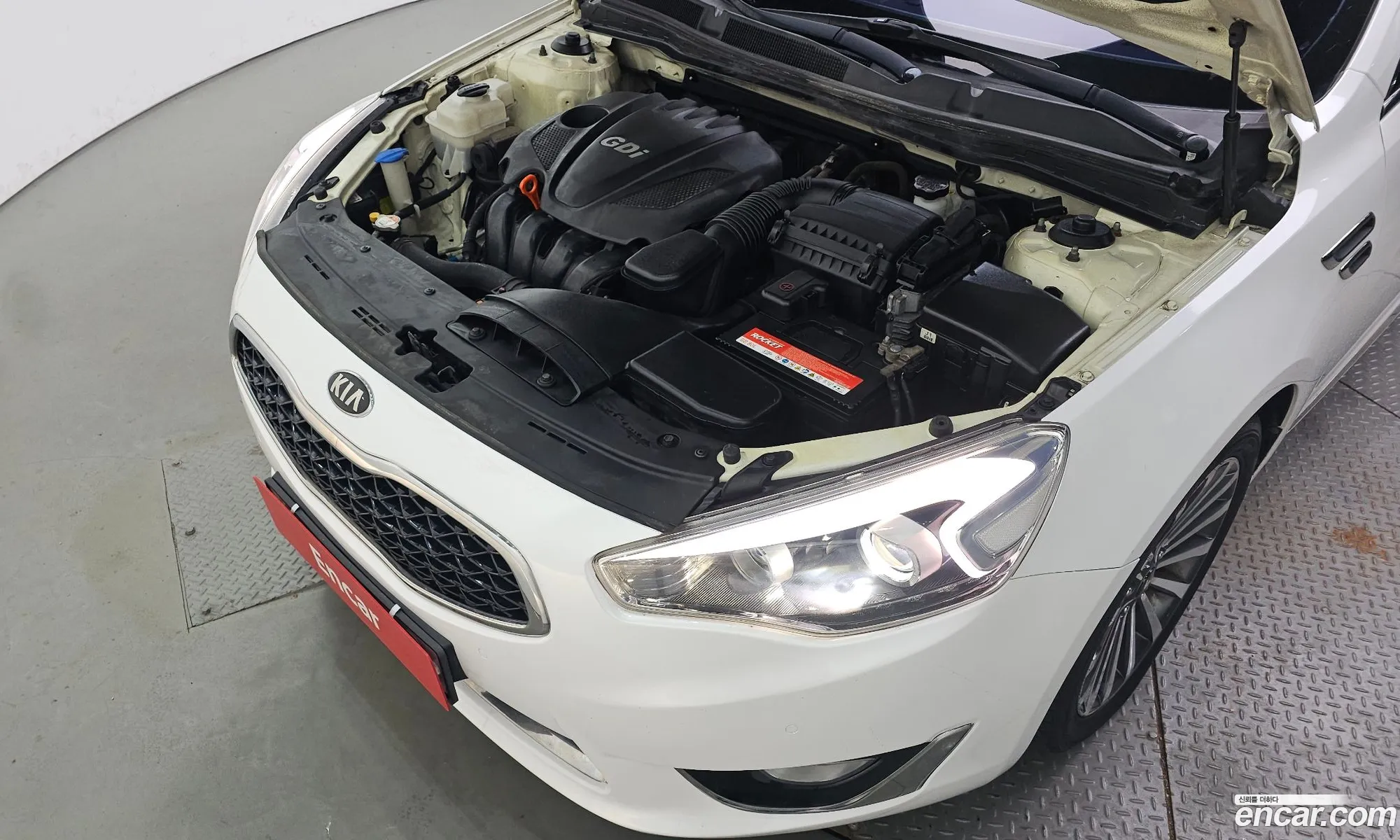 Kia K7 2013 KNALM415BDA112385 — 10