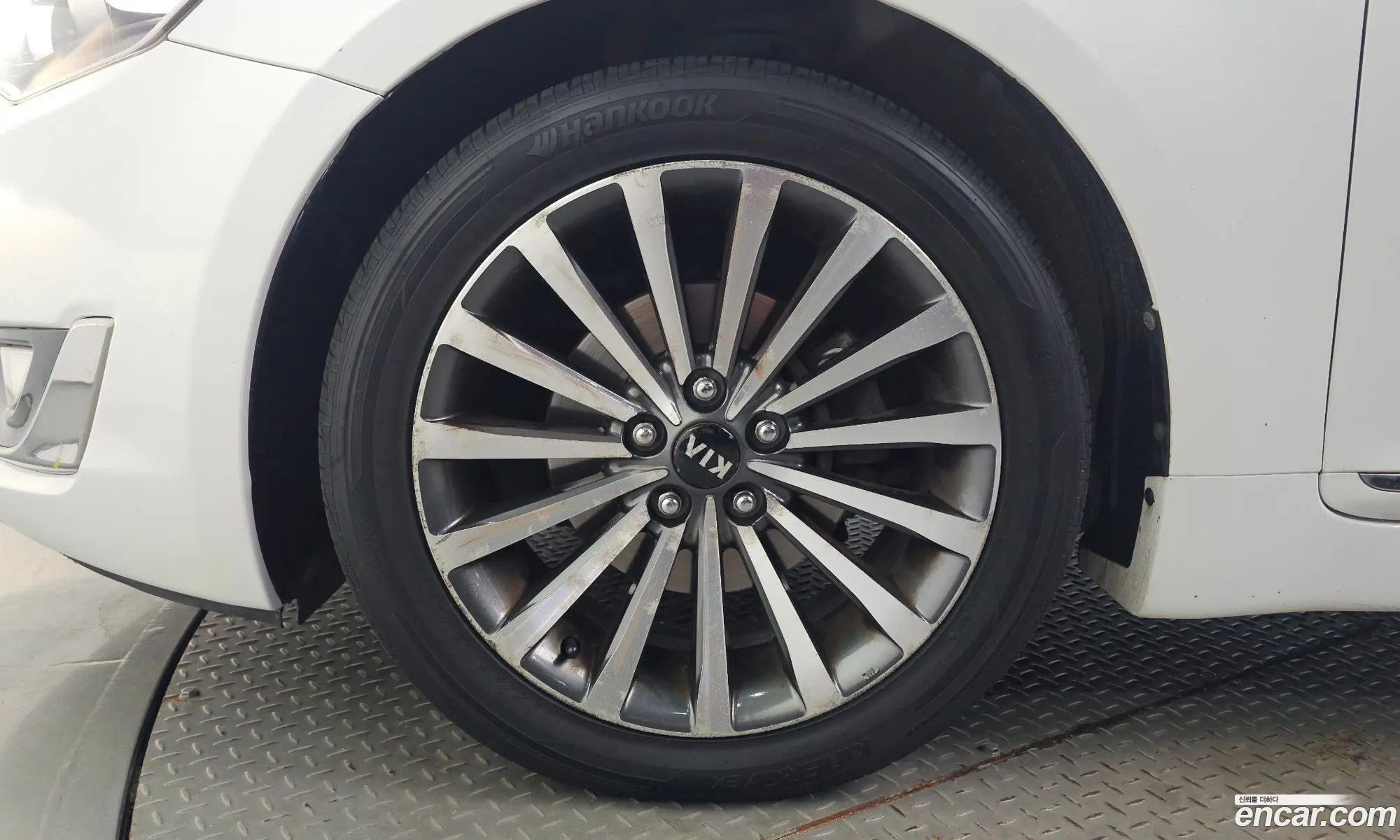 Kia K7 2013 KNALM415BDA112385 — 3