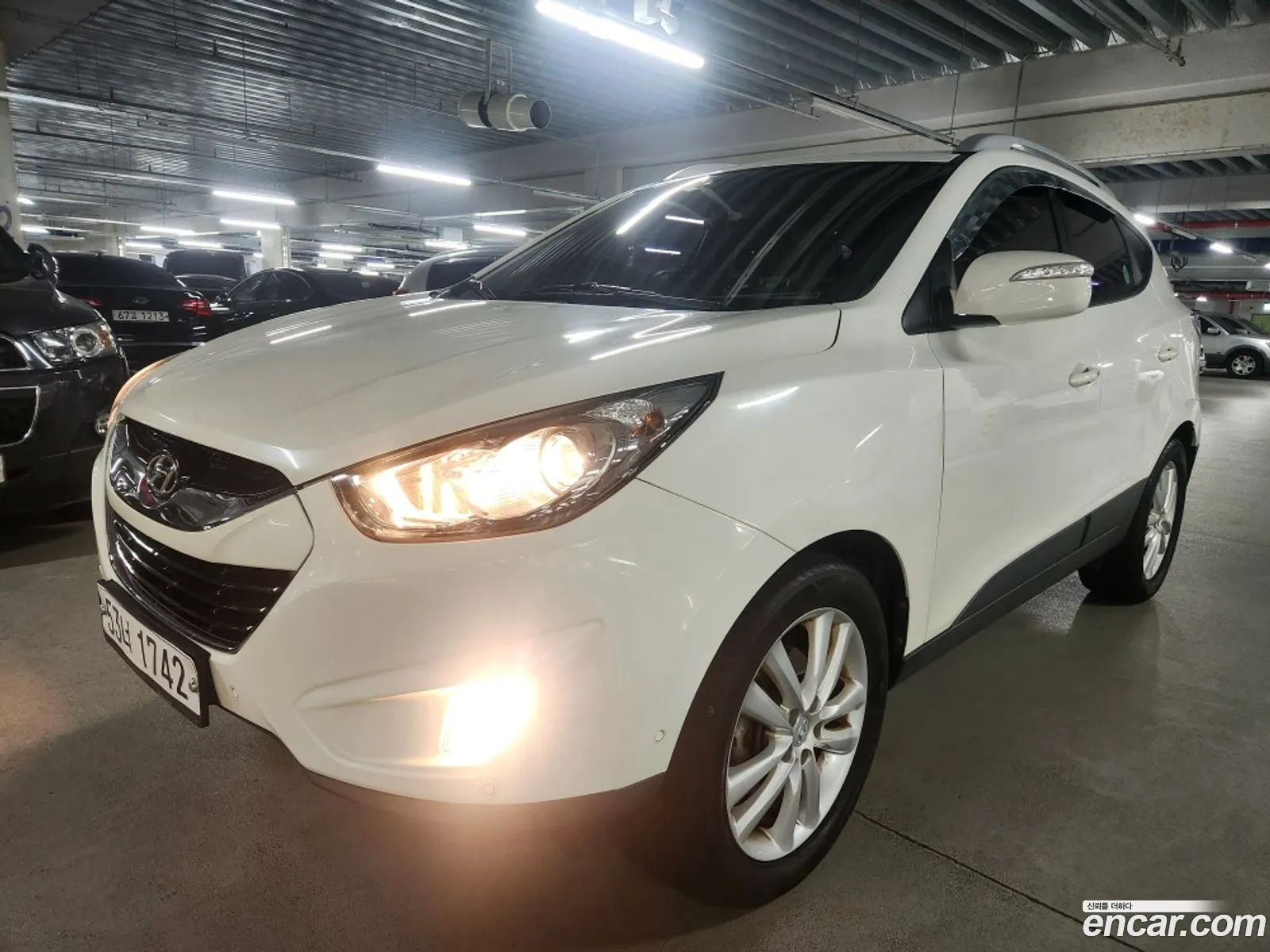Hyundai Tucson ix 2011 — 13
