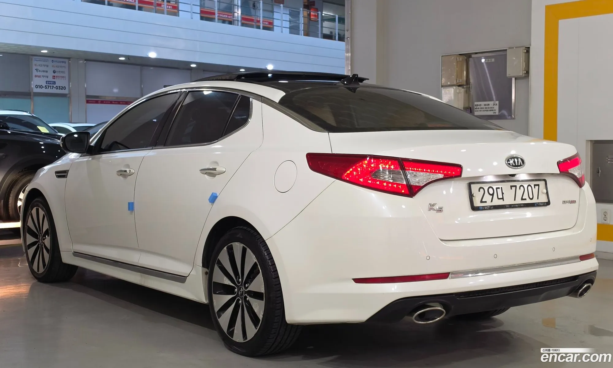Kia K5 2010 — 4