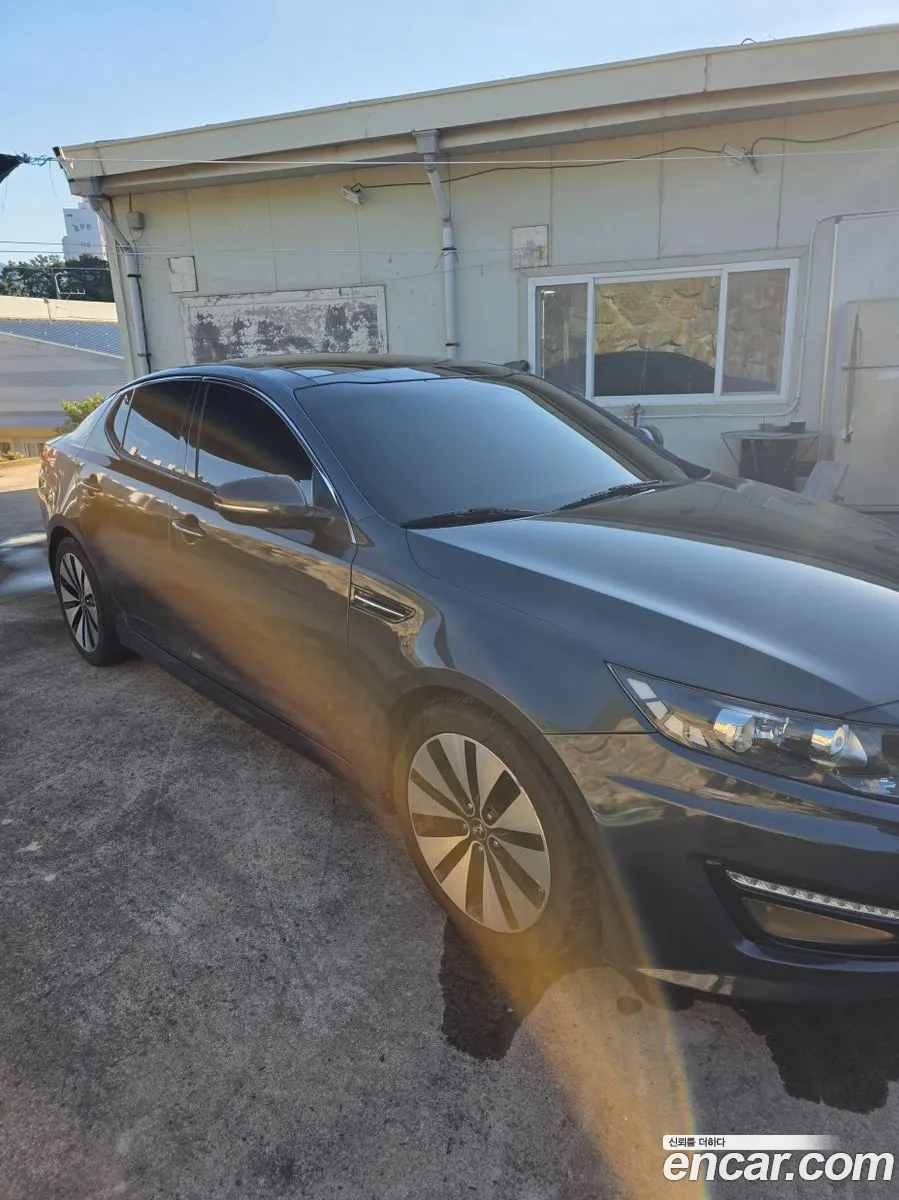 Kia K5 2011 — 11