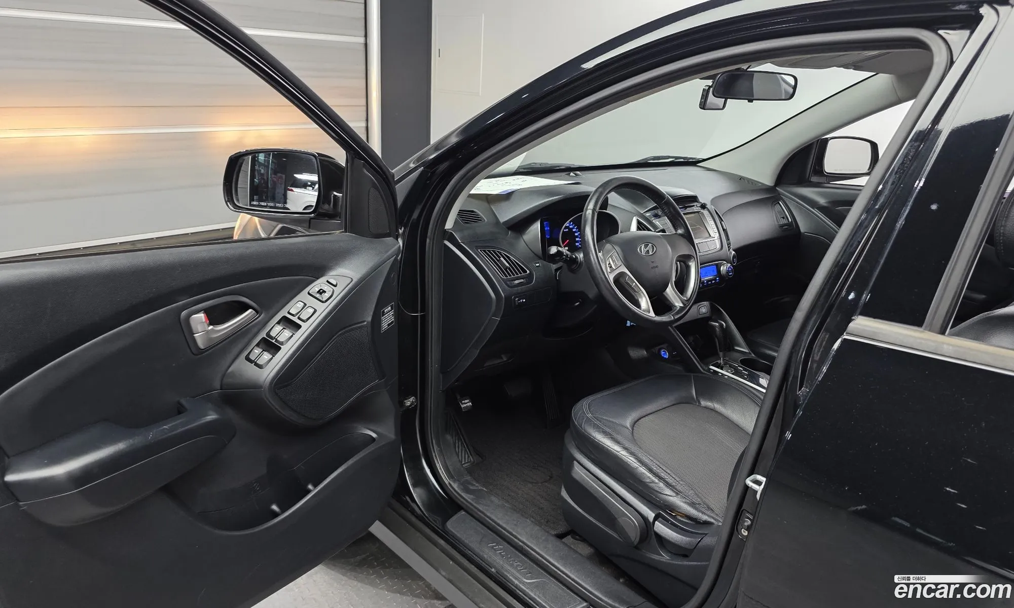 Hyundai Tucson ix 2009 — 11