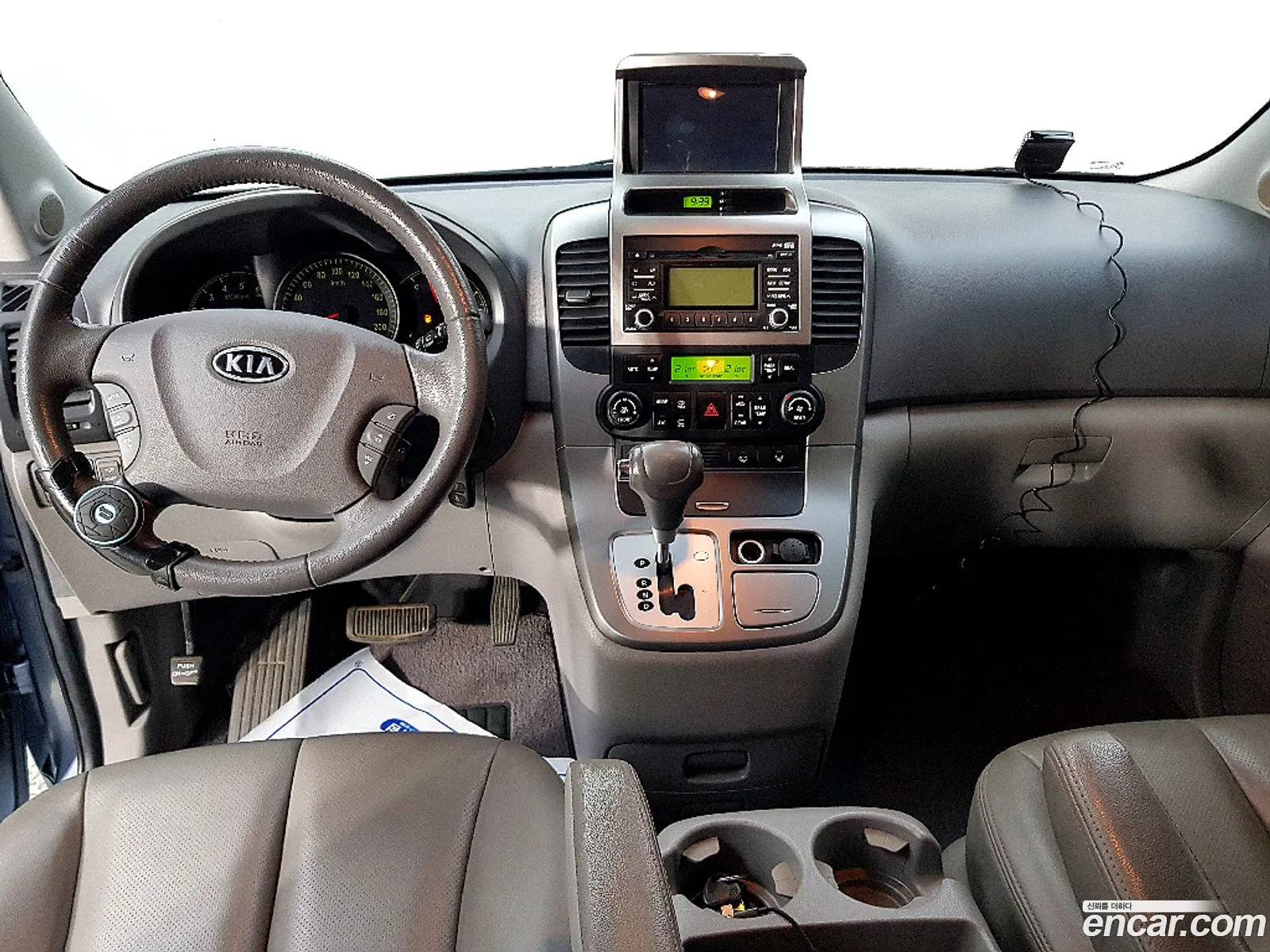 Kia Grand Carnival 2009 — 12